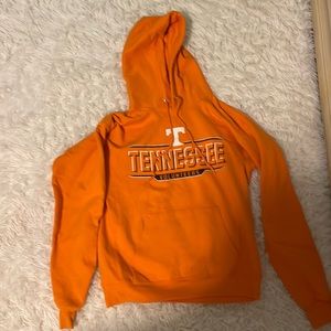 Orange Tennessee sweatshirt.